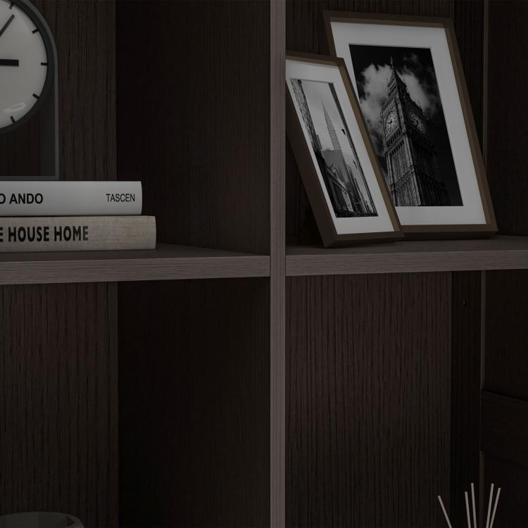 Dark brown cabinet shelf with framed photos and small book spines inside