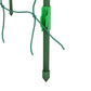 Green metal trellis leg with ground stake and attached wire mesh ties