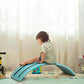 Turquoise-blue balance board with curved center ramp for standing play