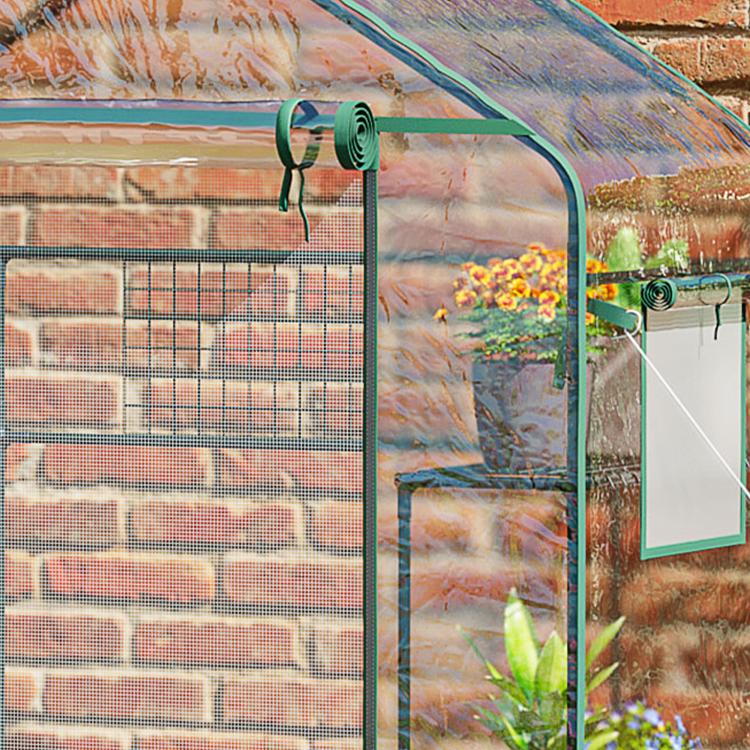 Greenhouse frame with mesh door and hanging plant labels, portable mini walk-in