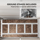 White metal shed base corner ground stakes securing the foundation to soil