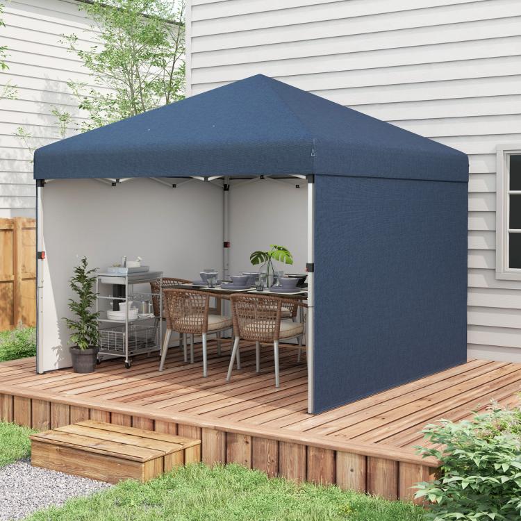 Navy pop-up canopy tent with sidewalls and open entry on a patio deck