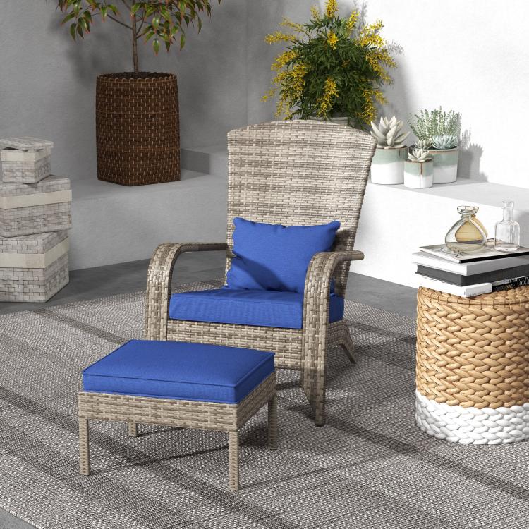 Wicker lounge chair with blue seat and back cushions and matching ottoman