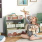 Green toy organizer with open bins for kids, featuring bear and tree-pattern storage