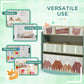 Green toy organizer with storage shelves and tree-pattern fabric bins