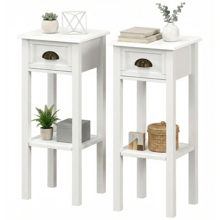 Two white 2-tier side tables, each with a drawer and lower open shelf for storage.