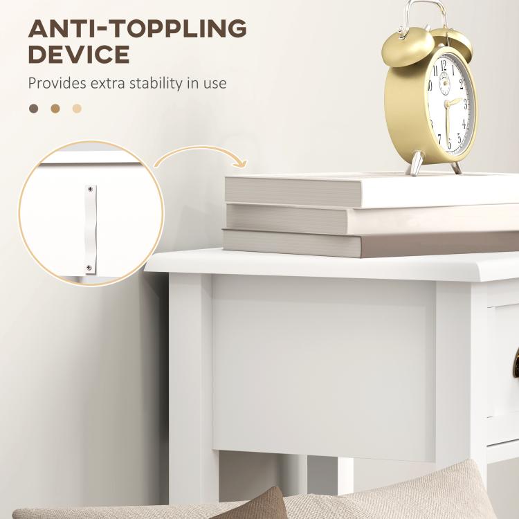 White side table detail with drawer and stable frame, close-up view of anti-tip area.