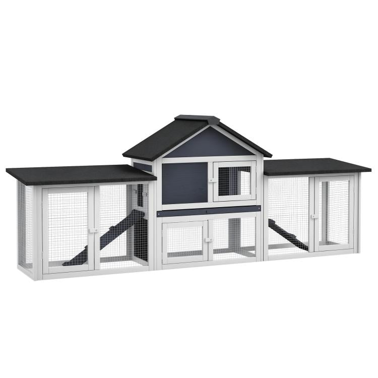Two-story dark gray and white wooden rabbit hutch with side run and wire doors