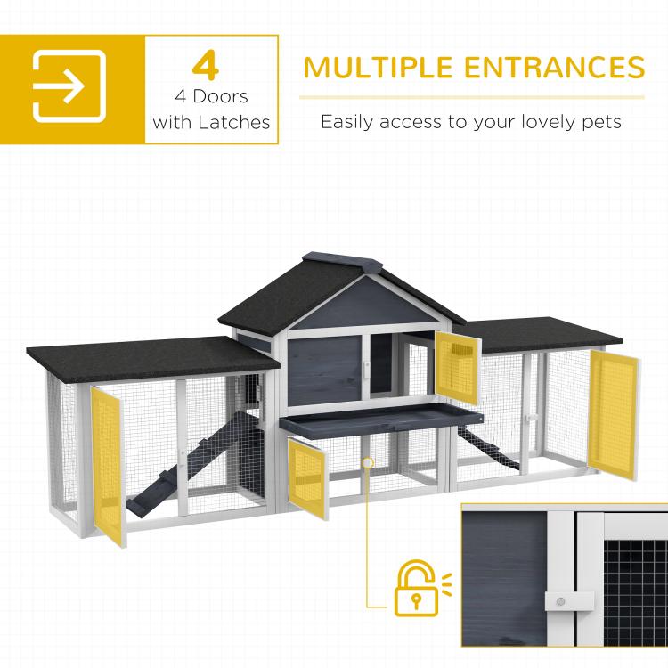 Two-story rabbit hutch with multiple latch doors, dark gray roof, and wire mesh runs