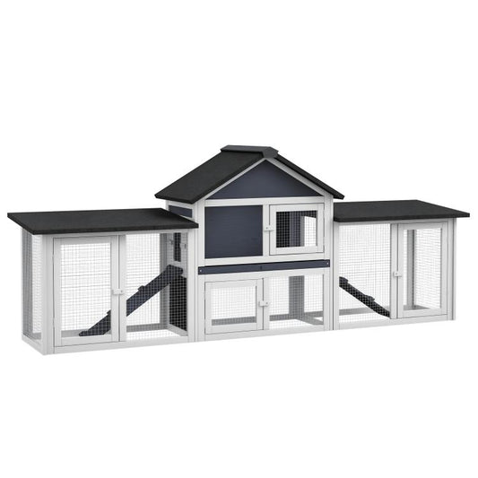 Two-story dark gray and white wooden rabbit hutch with side run and wire doors