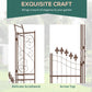 Brown metal garden arch arbor gate highlighting delicate scrollwork and arrow-top finials