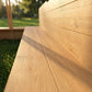 Wooden kids sandbox wooden board side panel close-up