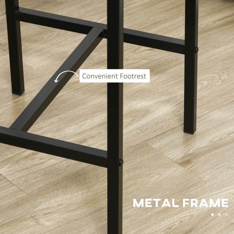 Gray metal bar stools with footrest and square frame under a matching bar table.