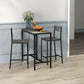 Gray bar table with two stools, each with slatted back and dark metal frame.