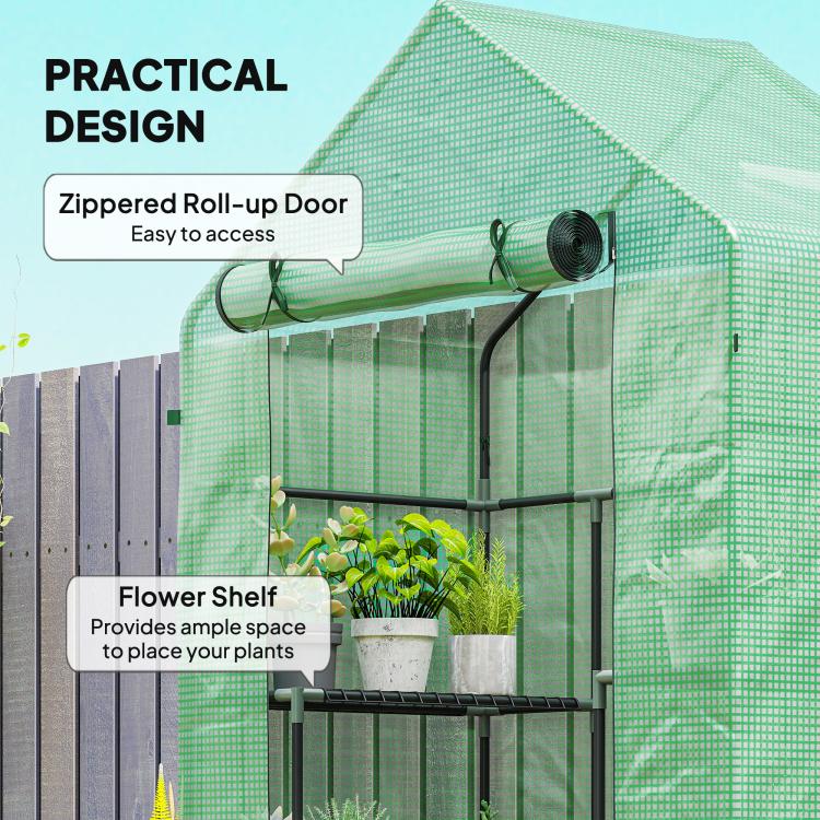 Green walk-in greenhouse with zippered roll-up door and shelf bars for plants