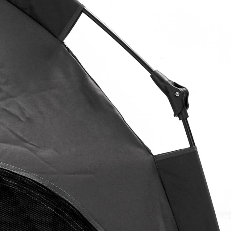 Dark gray pop-up dog tent metal support bar and fabric edge close-up