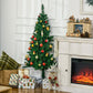 Artificial half Christmas tree decorated with ornaments, lights, and star topper