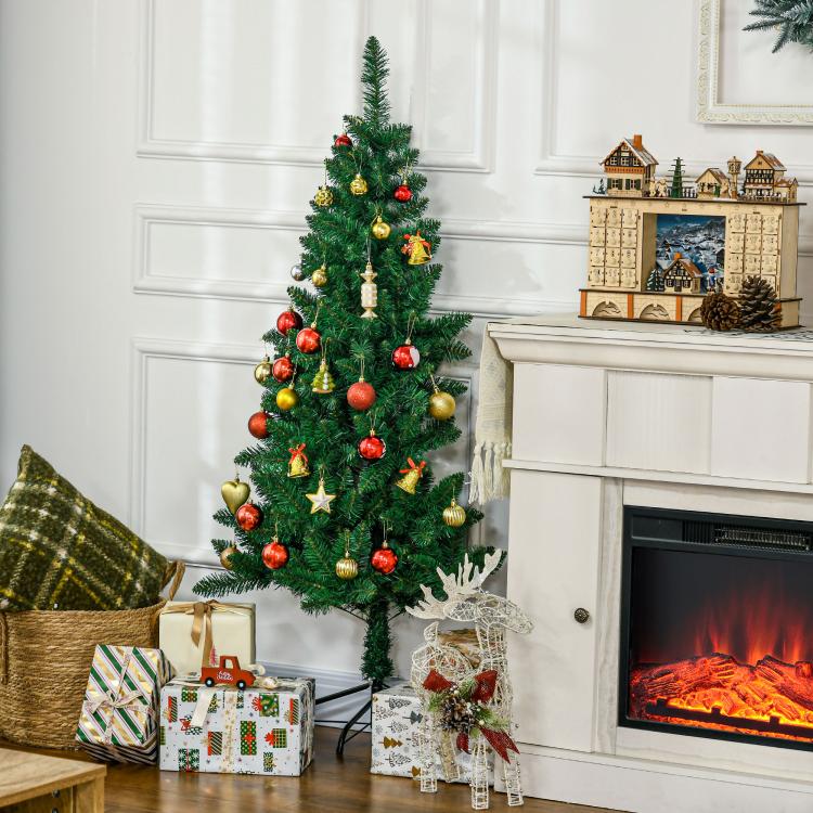 Artificial half Christmas tree decorated with ornaments, lights, and star topper