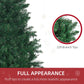 Artificial half Christmas tree branch tips detail with dense green foliage