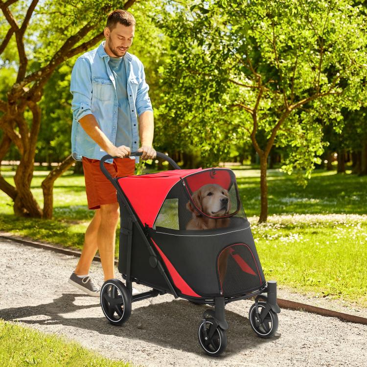 Red and black dog stroller with front mesh opening and reclining canopy