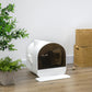 White enclosed cat litter box with brown door opening and raised front tray, no cat visible