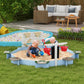 Blue wooden sandbox with sand filled base, white posts, green side seats, and outdoor toys