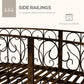 Bronze metal side railings with decorative scrollwork panels for a garden footbridge