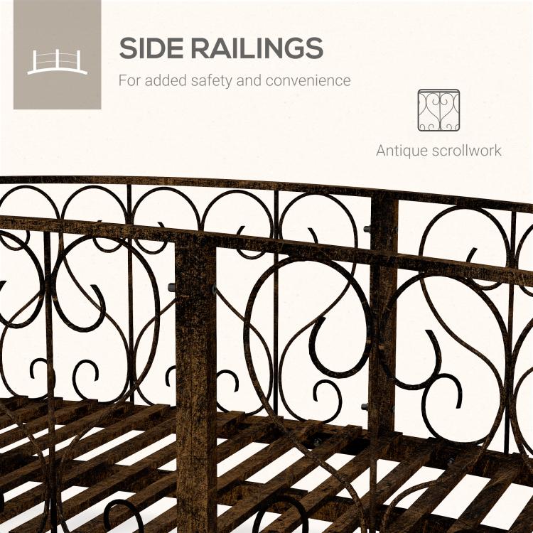 Bronze metal side railings with decorative scrollwork panels for a garden footbridge