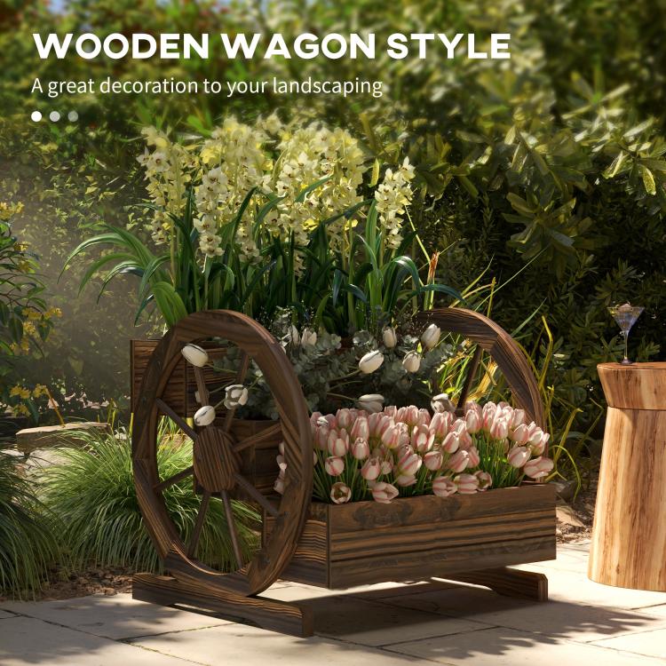 Wooden wagon-style planter box with two wheel frames, filled with mixed flowers