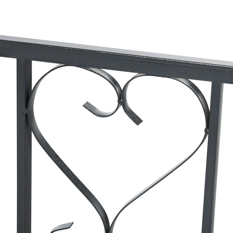 Grey metal garden arbor frame with heart vine scroll detailing