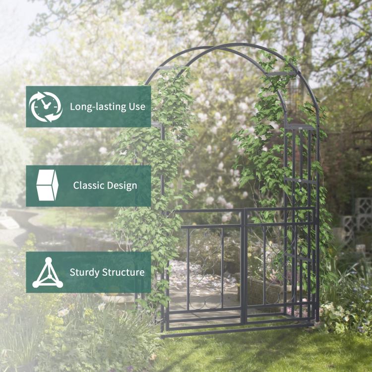 Grey metal garden arbor arch with open double doors and heart scrollwork detailing