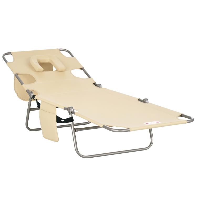 Beige tanning chaise lounge chair with face hole and padded head pillow