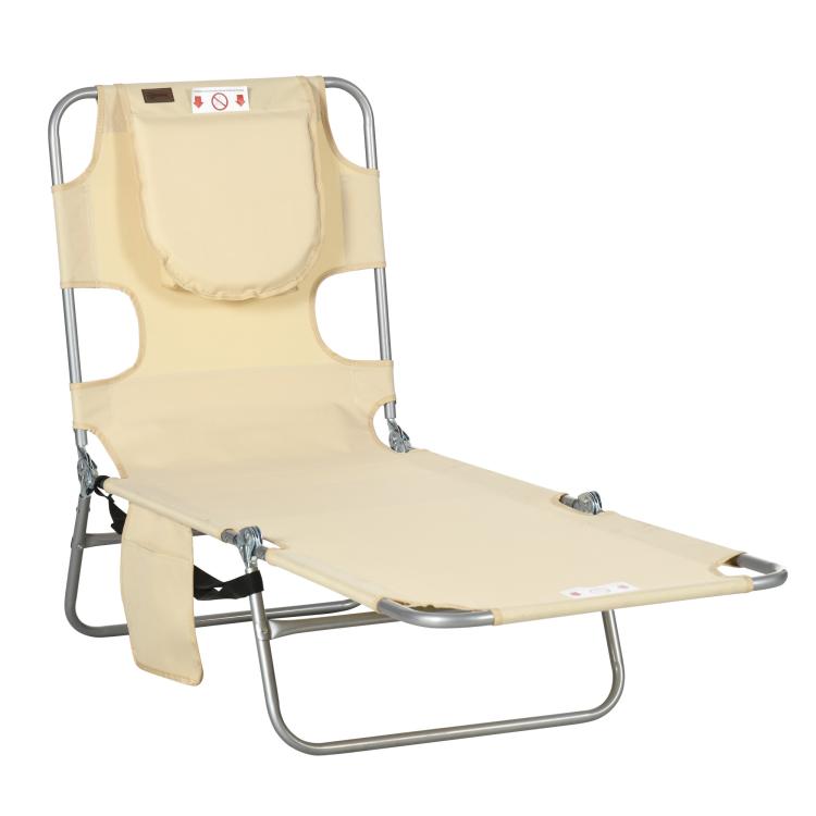 Beige face-hole tanning lounger with padded head pillow and steel base frame