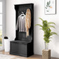 Black entryway hall tree with coat hooks and sitting bench, hanging coats and scarf
