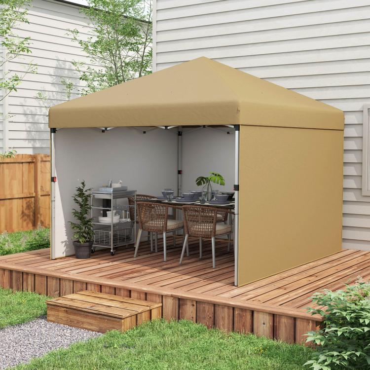 Beige pop-up canopy tent with sidewalls and open entry on a wooden deck
