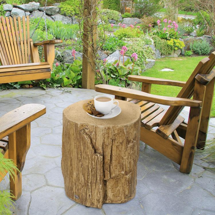 Tree stump end table with round top and bark-textured finish, used as patio side table