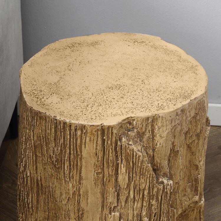 Close-up of tree stump end table top and side with rough concrete-like texture, brown