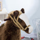 Kids dark brown rocking horse with fabric mane, bridle strap, and black eye