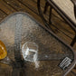 Outdoor side table with textured water-wave tempered glass top and metal base