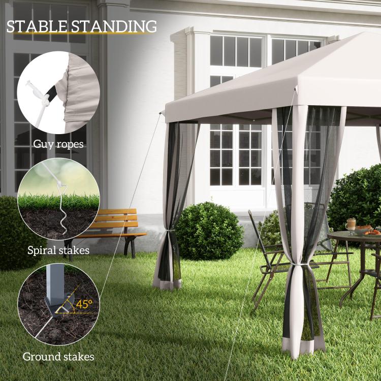 Beige pop-up canopy tent with guy ropes and ground stakes for stability