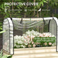 Clear protective cover over cream raised garden bed with plants inside