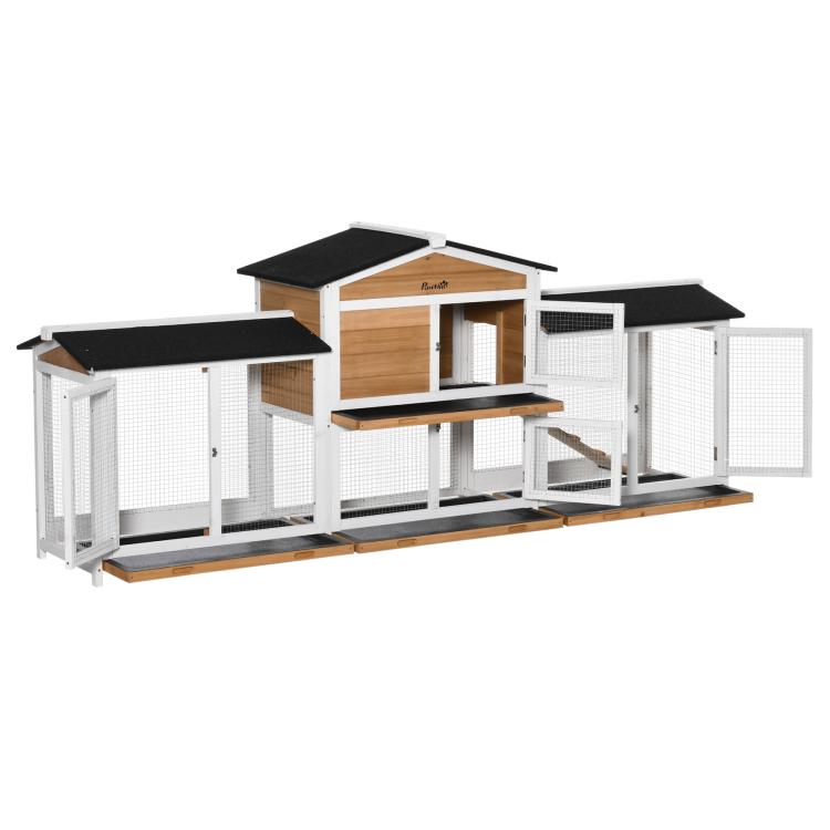 White rabbit hutch enclosure with two side run sections, black tops, and wooden ramp