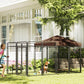 Outdoor dog kennel with steel wire mesh and brown canopy roof, front view in yard