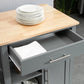 Gray rolling kitchen island with wood top, open drawer and shelf