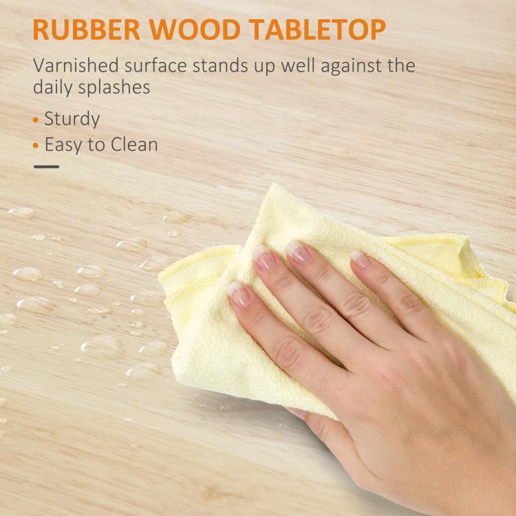 Light wood tabletop surface wiped with cloth, featuring smooth finish for a kitchen island cart