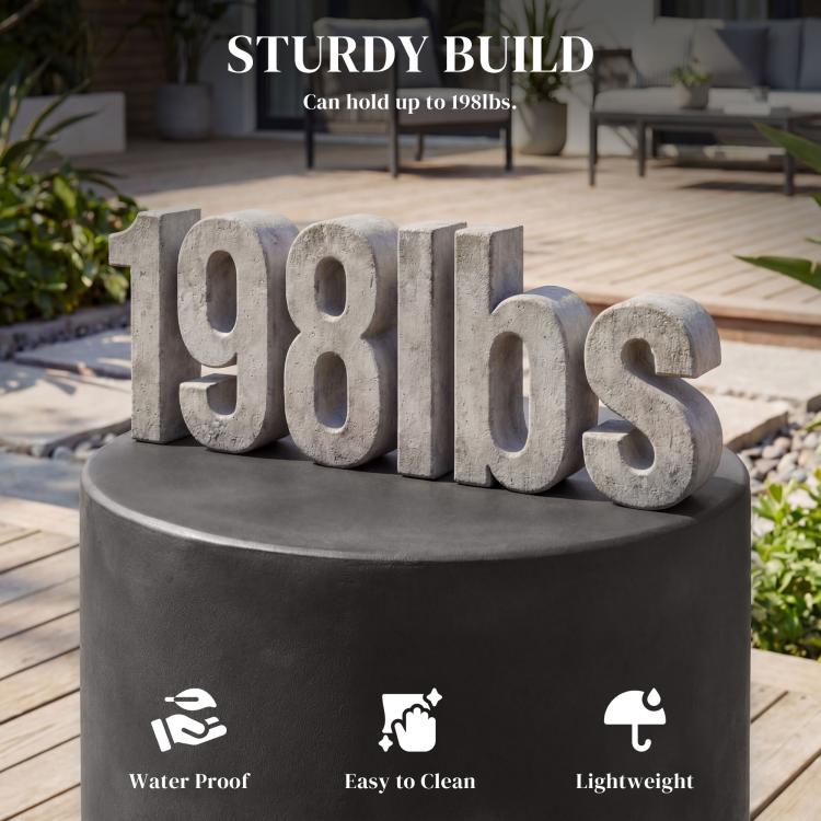 Outdoor-ready dark gray round side table with concrete-look finish and tall pedestal base