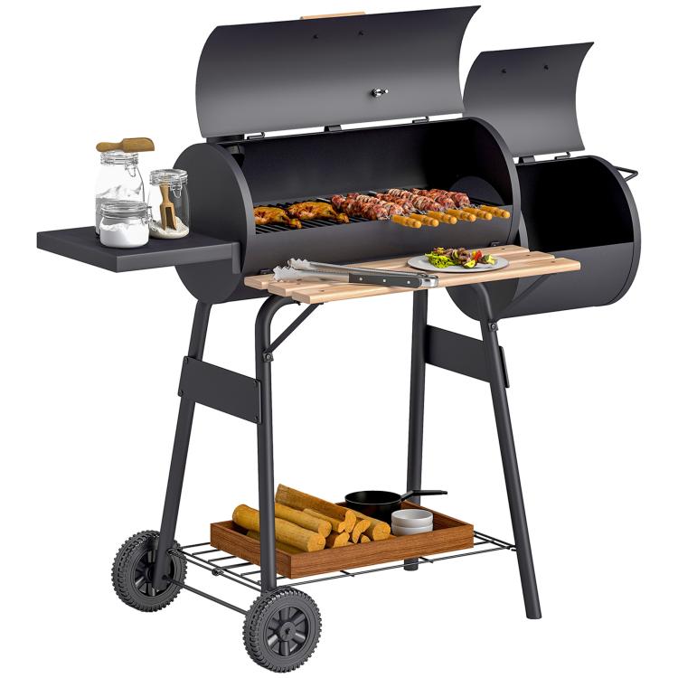 Charcoal BBQ grill and smoker combo with side table, open lid, cooking grates