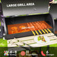 Charcoal BBQ grill and smoker combo interior with grilling rack and side prep board
