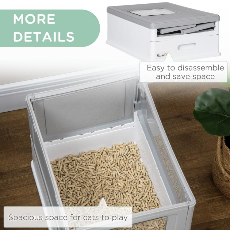 Gray and white enclosed cat litter box with top cover lifted and litter tray exposed