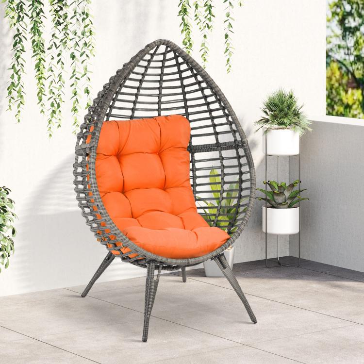 Outdoor egg chair with orange cushion in dark PE wicker teardrop seat frame
